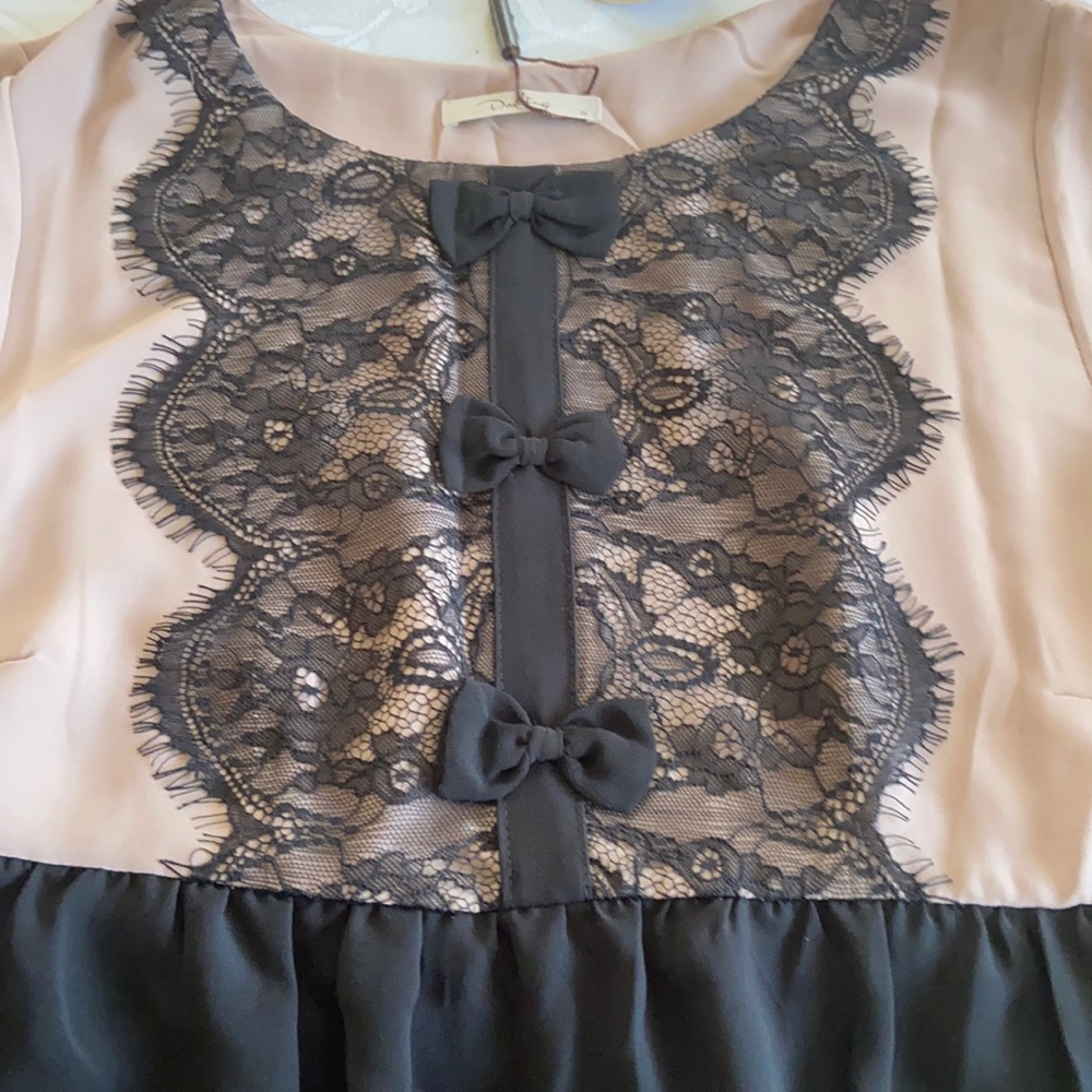 Stunning DARLING brand Maternity top.